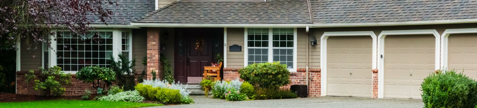 Welcoming Goodyear, AZ home with a modern and pristine garage door, highlighting expert blog content