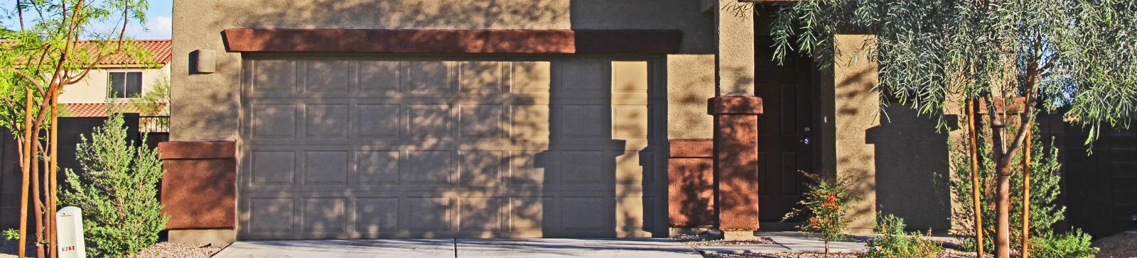Two-story home in Goodyear, Arizona with double garage door serviced by Garage Door Repair Goodyear