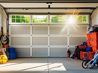 Clean and well-maintained garage door prepared for summer in a sunny Goodyear, AZ neighborhood
